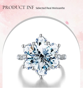 Close-up of a 5-carat Moissanite sunflower ring in a classic six-prong silver setting