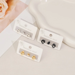 Minimalist stainless steel stud earring set with heart shapes and cubic zirconia accents