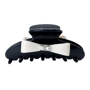 Elegante pinza per capelli in acetato nero con fiocco crema e perle sintetiche