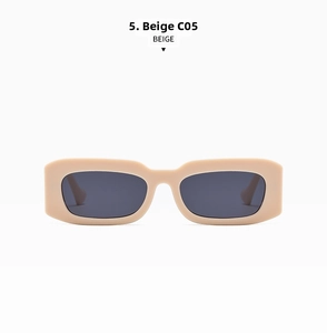 Detail view of vintage beige square sunglasses with dark UV protection lenses and flat top