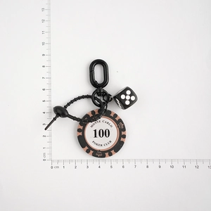 Poker chip and dice keychain set featuring Monte Carlo design and black spring clip