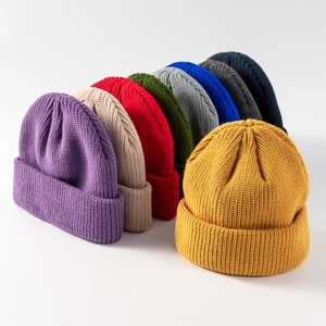Multiple colors of ribbed knit beanie hats for men and women in winter fashion style