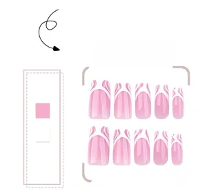 Detail of pink and white gradient French tip press-on nails with abstract stripe pattern