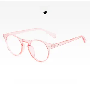 Detail of pink transparent round frame glasses with lightweight resin material