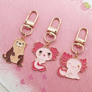 Porte-clés en métal dessin animé loutre et axolotl avec fermoirs dorés