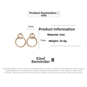 Detail view of multi-layered gold geometric hoop earrings with 5.4cm x 7.4cm size