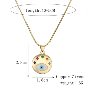 Detailed view of evil eye heart pendant with dimensions and copper zircon material info