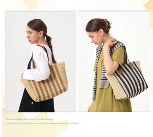Detailed view of striped straw woven tote bags with leather straps for beach vacation