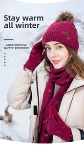 Three-piece winter set including burgundy knit beanie with fur pom, scarf and gloves