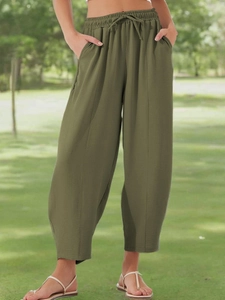 Pantalon large femme en lin vert olive avec taille à cordon et poches latérales