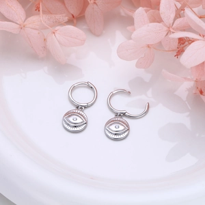 Close-up of S925 sterling silver evil eye drop earrings with sparkling center zircon detail