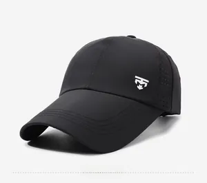 Detail view of black breathable baseball cap with laser-cut vents and side logo