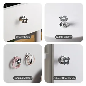 Silver flower toilet press and handle for cabinets shown in four versatile use cases