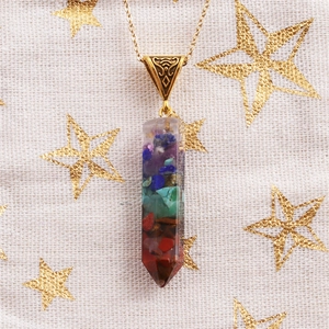 Hexagonal crystal column necklace with multi-color crushed stones and gold chain detail