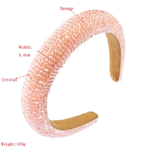 Detail showing pink crystal headband width of 3.0cm and weight of 104g on sponge padding