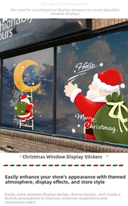 Detailed view of Santa Claus and crescent moon Christmas static window decal on glass shopfront