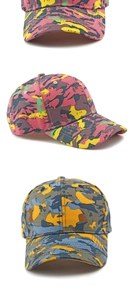 Close-up of cotton camouflage baseball caps showing twill fabric and stitching detail