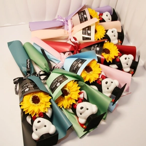 Detail of graduation bouquets with plush teddy bears and sunflower soap flowers