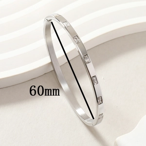 Silver stainless steel bangle with rectangular rhinestones and 60mm diameter measurement