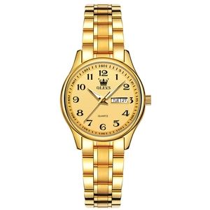 Classic gold quartz watch for women with metal strap featuring day and date display