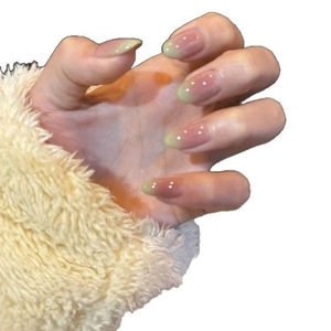 Pink and green gradient press-on nails with high-gloss finish and fuzzy sleeve accent