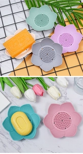 Macro detail of lotus shaped silicone soap dish with drainage holes in multiple colors