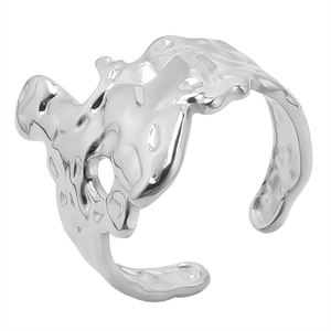 Detailed view of silver irregular liquid-style texture on stainless steel adjustable ring