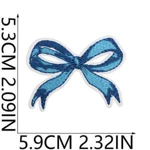 Blue bow embroidered patch with precise 5.9cm x 5.3cm size measurement on white background