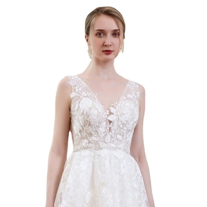 Sleeveless V-neck lace wedding dress with floral embroidery and elegant short train