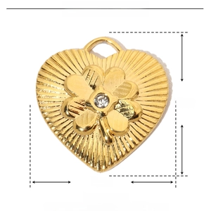 Detailed view of heart-shaped clover pendant with diamond showing 18mm by 17mm size dimensions
