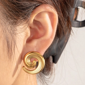 Gold spiral starfish earrings in stainless steel with textured radial stripe finish