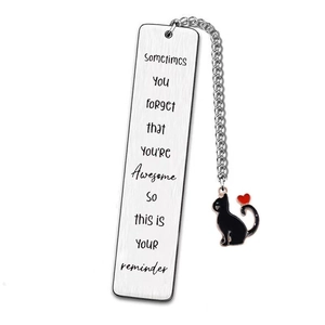 Detail of silver stainless steel bookmark with black cat charm and engraved reminder