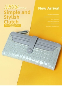 Detail of light blue long wallet with dual-textured leather and metal zipper closure