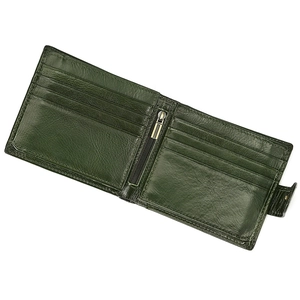 Detailed interior of dark green leather wallet showing card slots and zipper pocket
