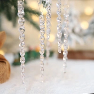 Macro shot of hanging clear acrylic icicle ornaments with realistic spiral design for trees