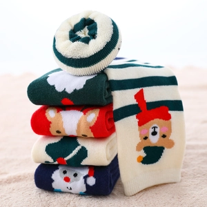 Thick Christmas socks for children with warm fleece lining and festive cartoon patterns