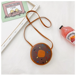 Detail view of the round chocolate brown donut bag with colorful Hello embroidery