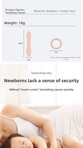 Detail view of pink cotton gauze baby security blanket with 6cm wooden teething ring