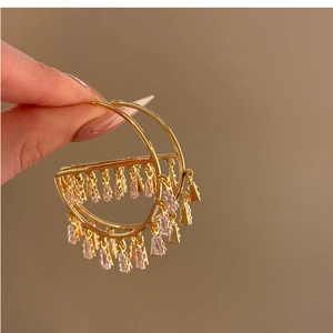 Elegant gold-tone semi-hoop tassel earrings with rectangular cubic zirconia crystals