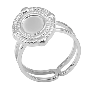 Detail of silver adjustable oval signet ring with radial texture and bead accents
