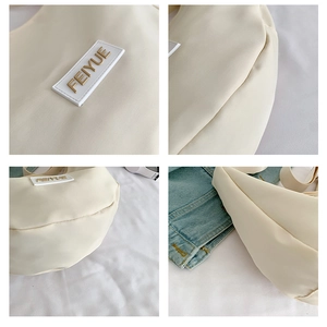 Vues détaillées du sac en toile beige montrant le logo FEIYUE, les coutures et le fond