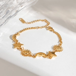 18K gold plated stainless steel bracelet with celestial sun moon and star charms
