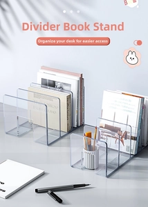 Top-down view of transparent acrylic bookends with multi-grid dividers on a gray desk