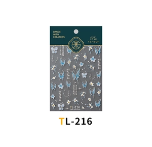 Detailed view of 5D embossed butterfly nail stickers with floral accents and micro pearls