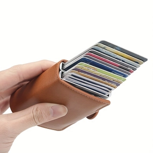 Brown leather RFID blocking wallet with automatic pop-up cards mechanism and aluminum core