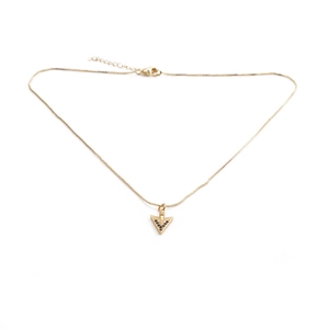 Gold arrow pendant necklace with black zircon stones on a minimalist metal chain