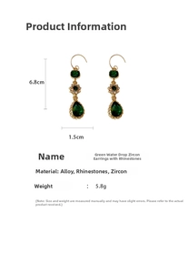 Detailed view of emerald green drop earrings with size specs 6.8cm length and 1.5cm width
