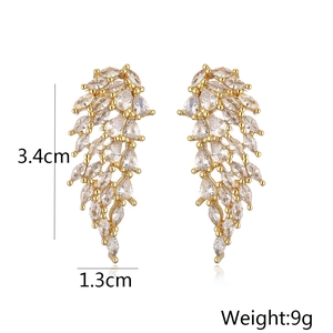 Detail showing dimensions of leaf-shaped gold earrings with zircon, 3.4cm tall and 9g weight