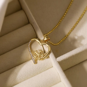 18K gold plated heart necklace with snowflake design and zircon inlay in jewelry box