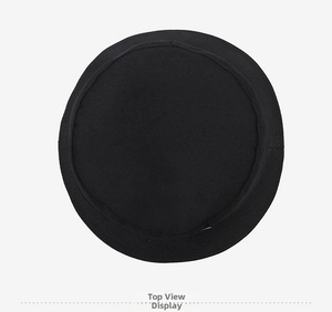 Top-down view of black cotton bucket hat showing fabric texture and crown structure